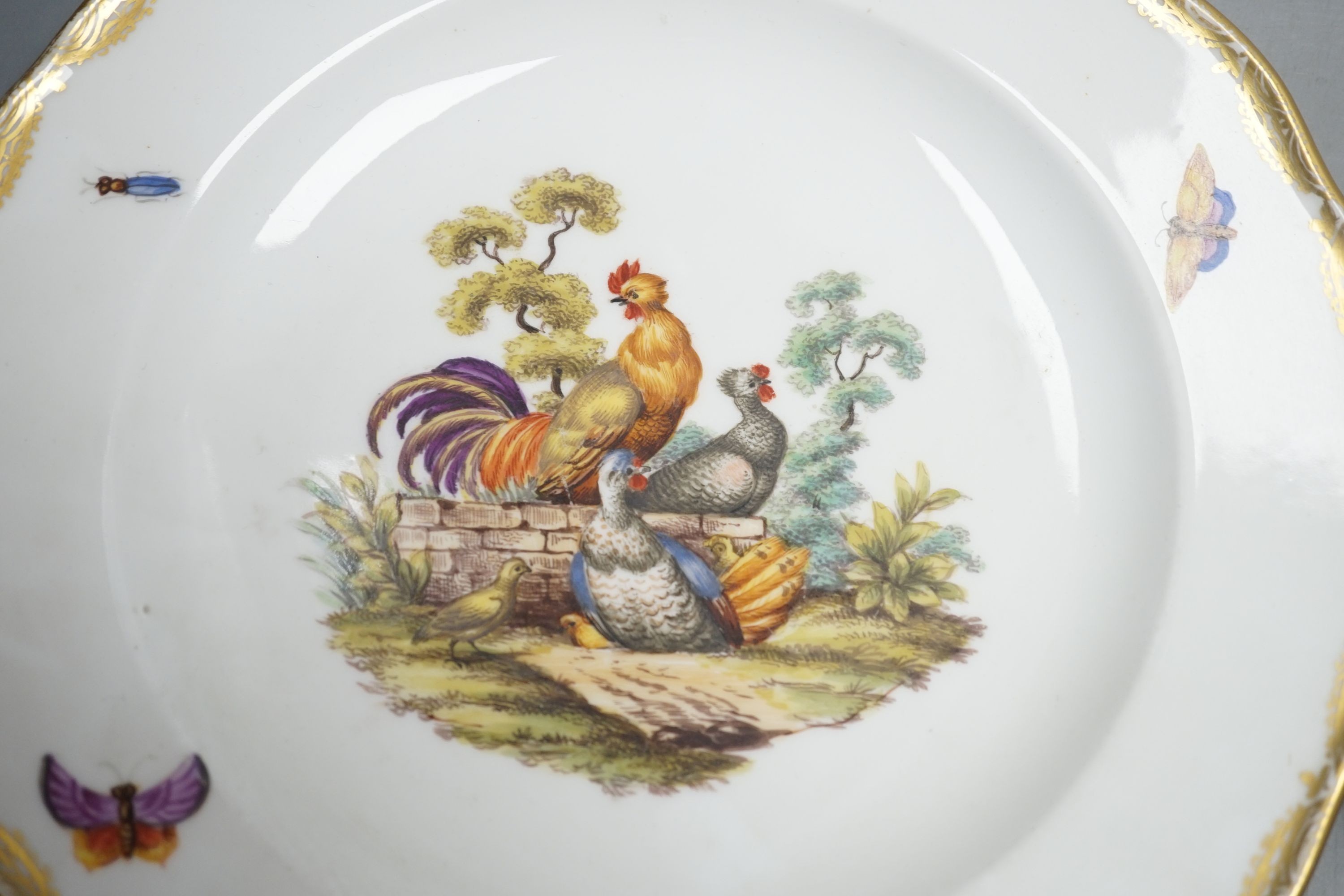 A pair of 19th century Meissen outside decorated bird plates, 24.5cm